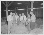 Mayor and others at tobacco warehouse